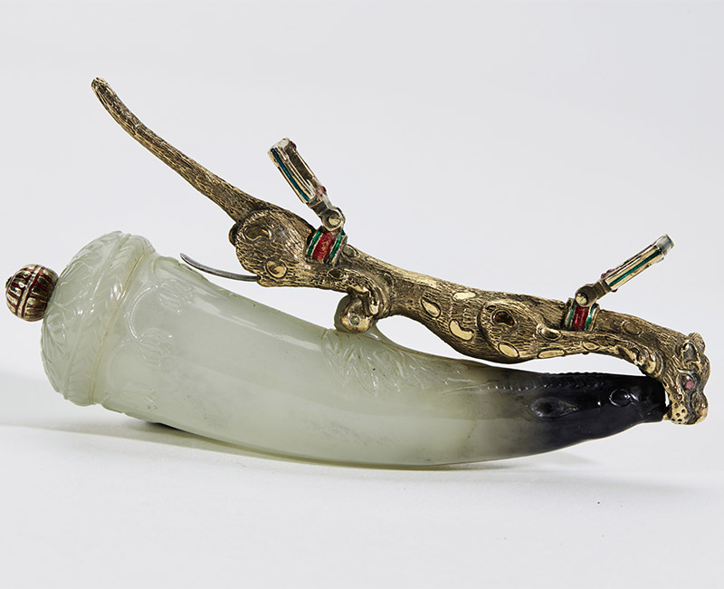 a rare mughal carved jade powder horn